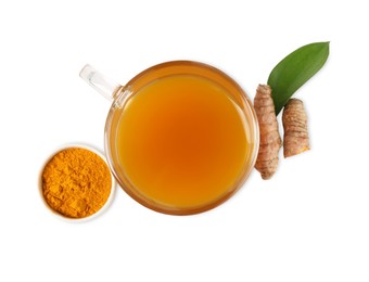 Photo of Aromatic turmeric tea in glass cup, roots, powder and green leaf isolated on white, top view