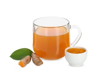 Photo of Aromatic turmeric tea in glass cup, roots, powder and green leaf isolated on white