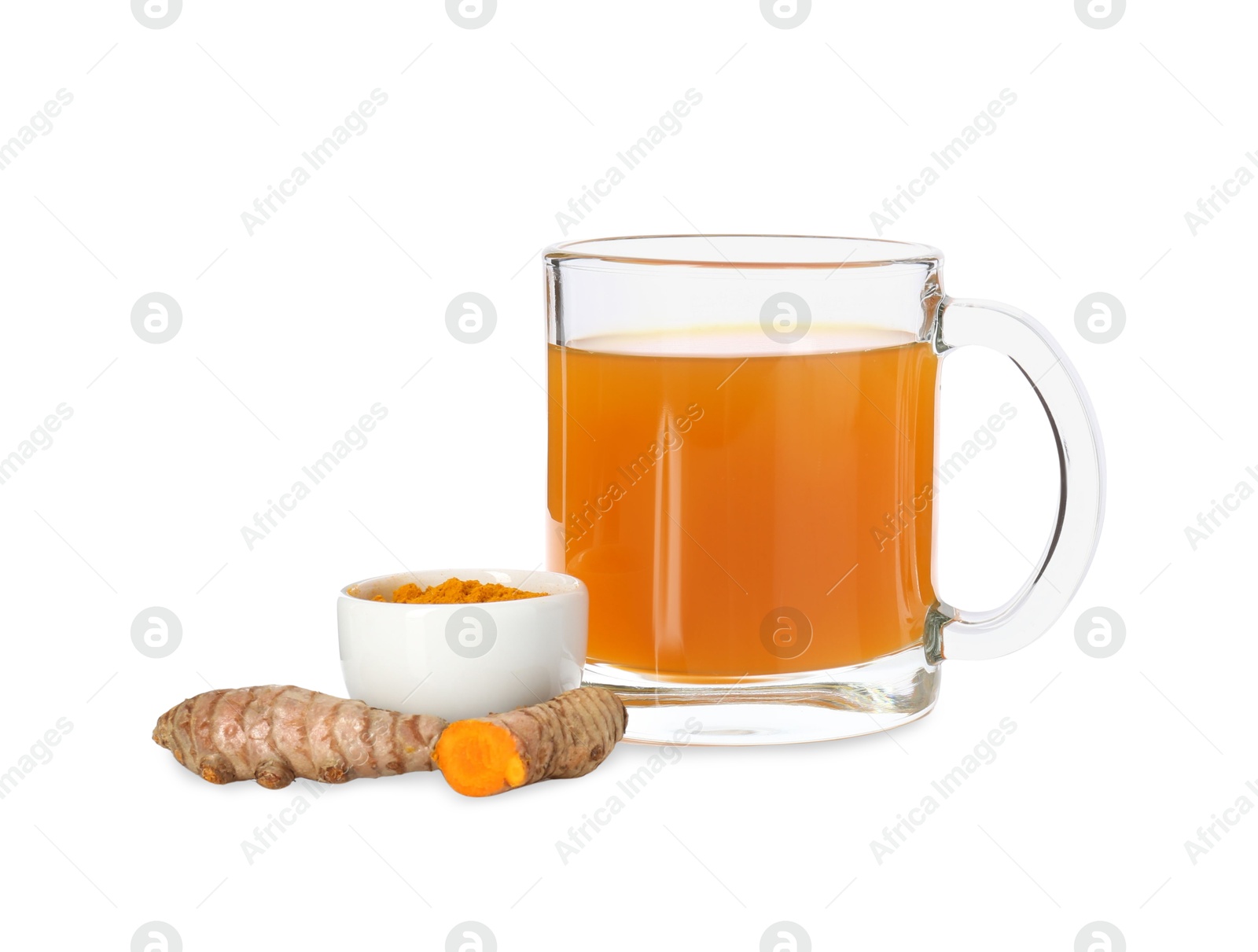 Photo of Aromatic turmeric tea in glass cup, roots and powder isolated on white