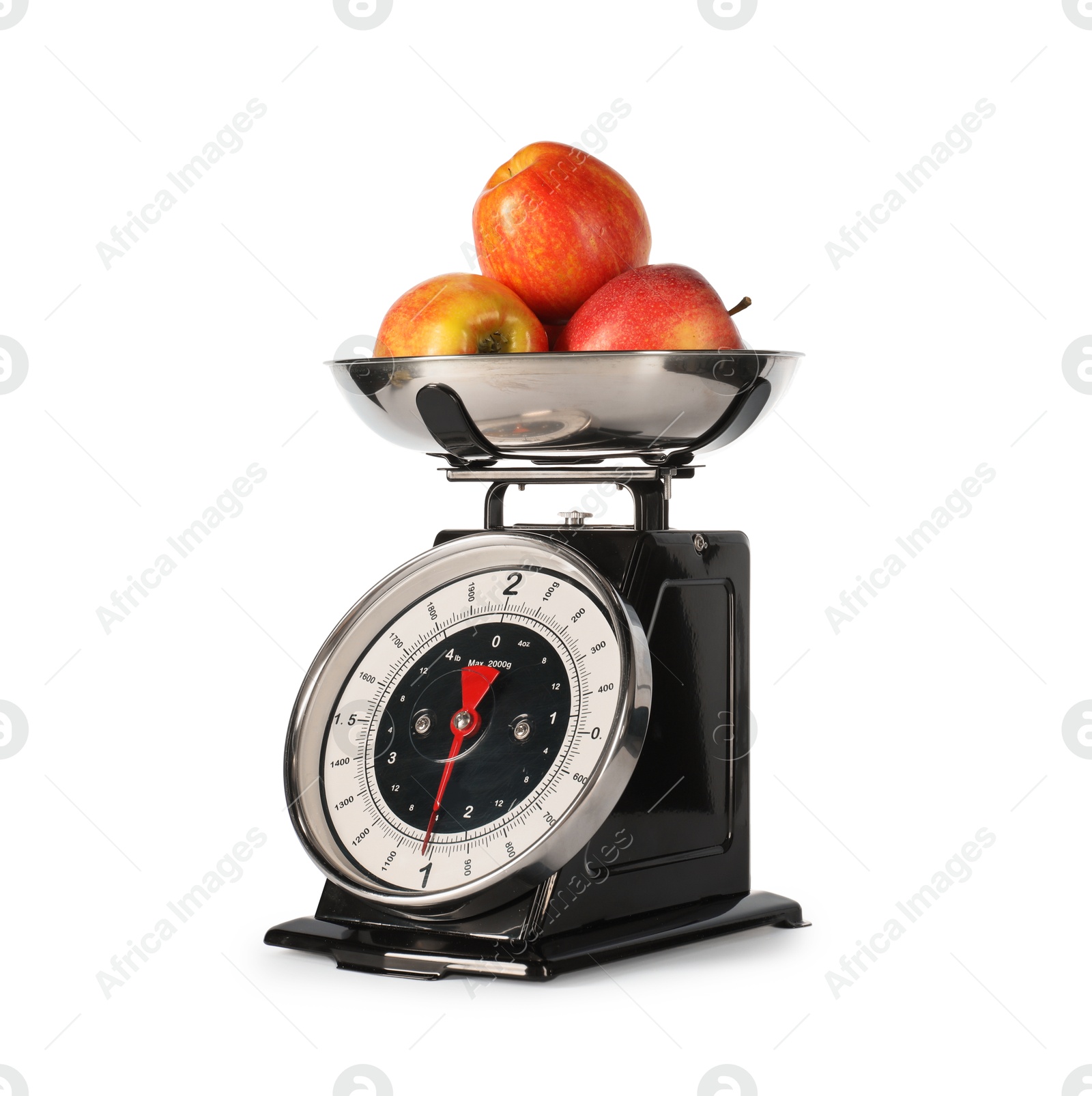 Photo of Retro mechanical kitchen scale with apples isolated on white