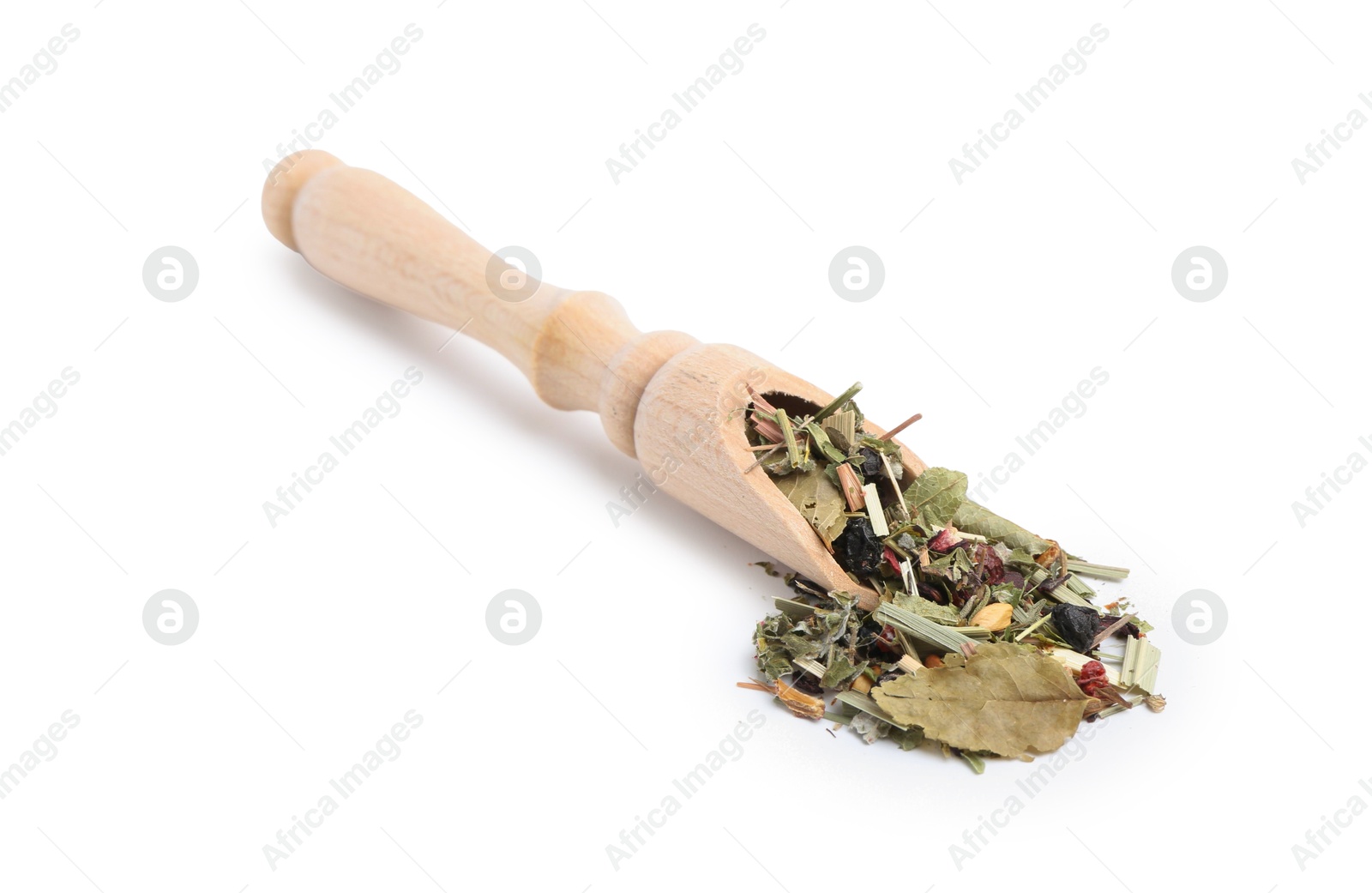 Photo of Dry herbal tea brew in scoop isolated on white