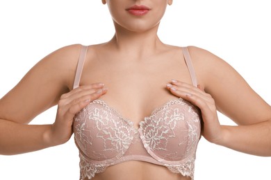 Photo of Woman wearing beautiful bra on white background, closeup