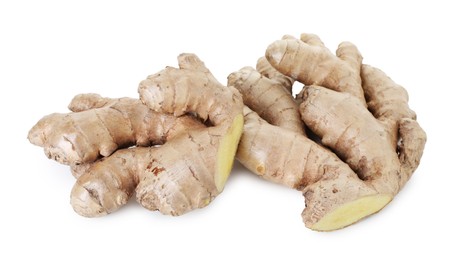 Photo of Fresh ginger isolated on white. Root vegetable