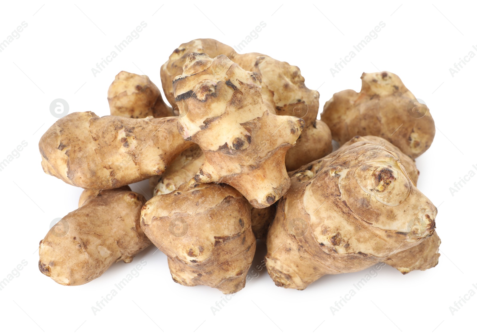 Photo of Fresh Jerusalem artichokes isolated on white. Root vegetable