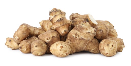 Photo of Fresh Jerusalem artichokes isolated on white. Root vegetable