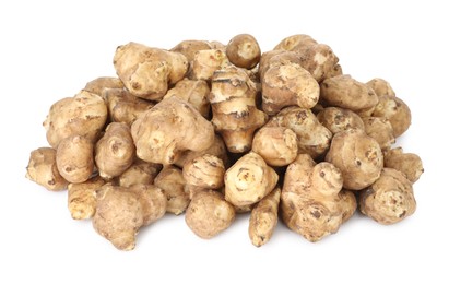 Photo of Fresh Jerusalem artichokes isolated on white. Root vegetable