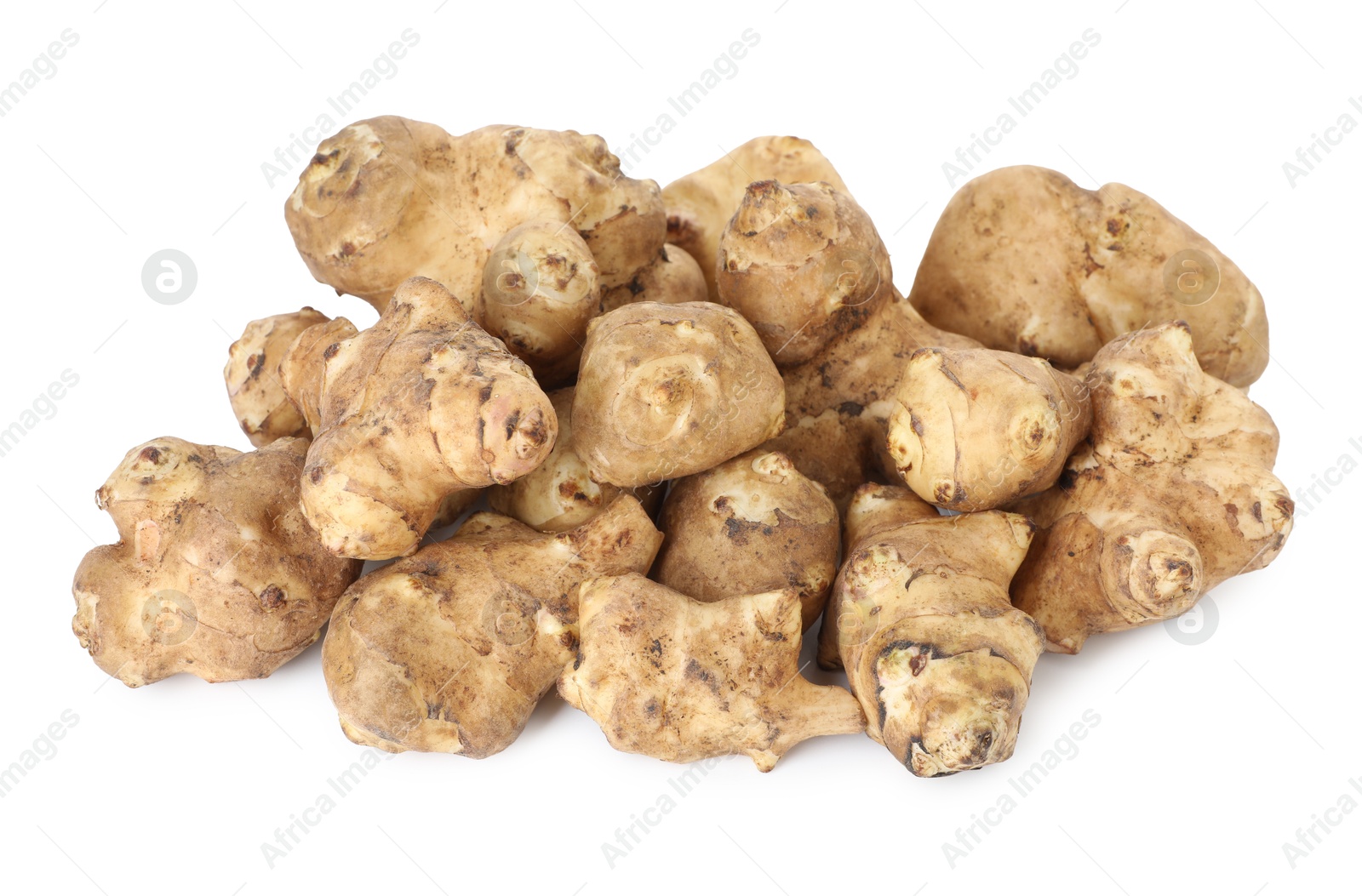 Photo of Fresh Jerusalem artichokes isolated on white. Root vegetable