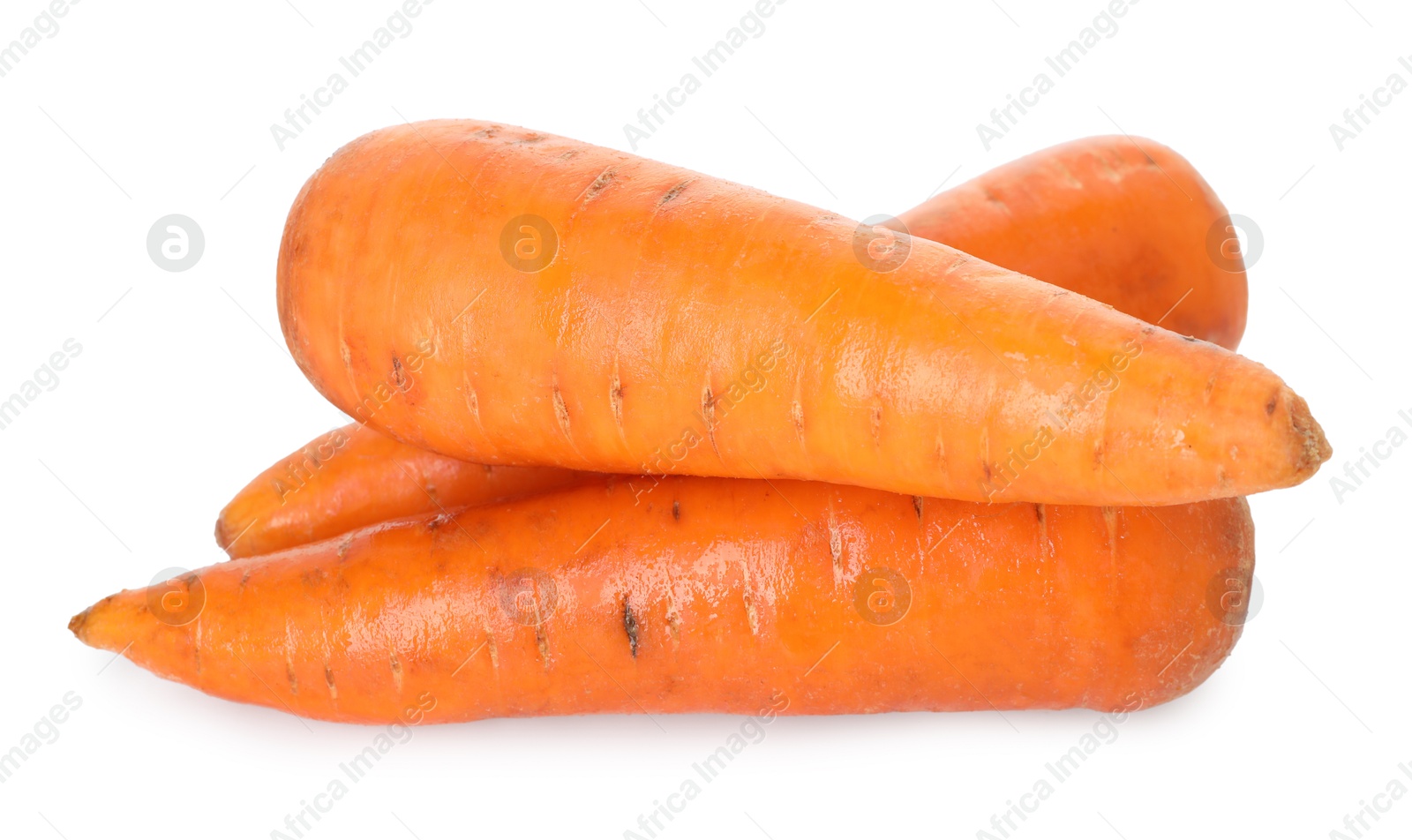 Photo of Fresh carrots isolated on white. Root vegetable