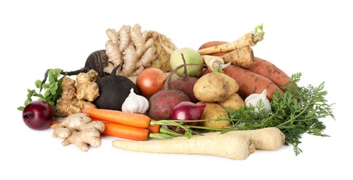 Photo of Many different root vegetables isolated on white