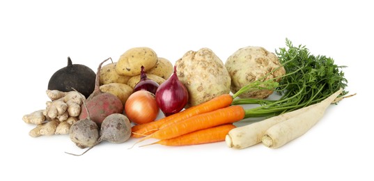 Photo of Many different root vegetables isolated on white