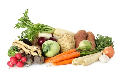 Photo of Many different root vegetables isolated on white