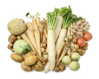 Photo of Many different root vegetables isolated on white, top view