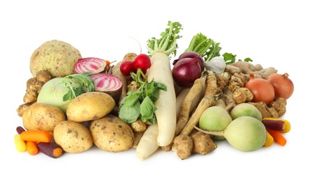 Photo of Many different root vegetables isolated on white