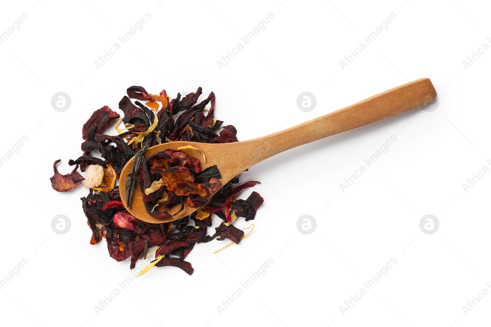 Photo of Spoon with dried tea leaves isolated on white, top view