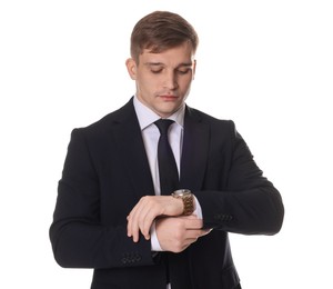 Photo of Man in classic suit checking time on white background