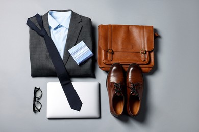 Photo of Elegant men's outfit. Stylish clothes, accessories and shoes on grey background, flat lay