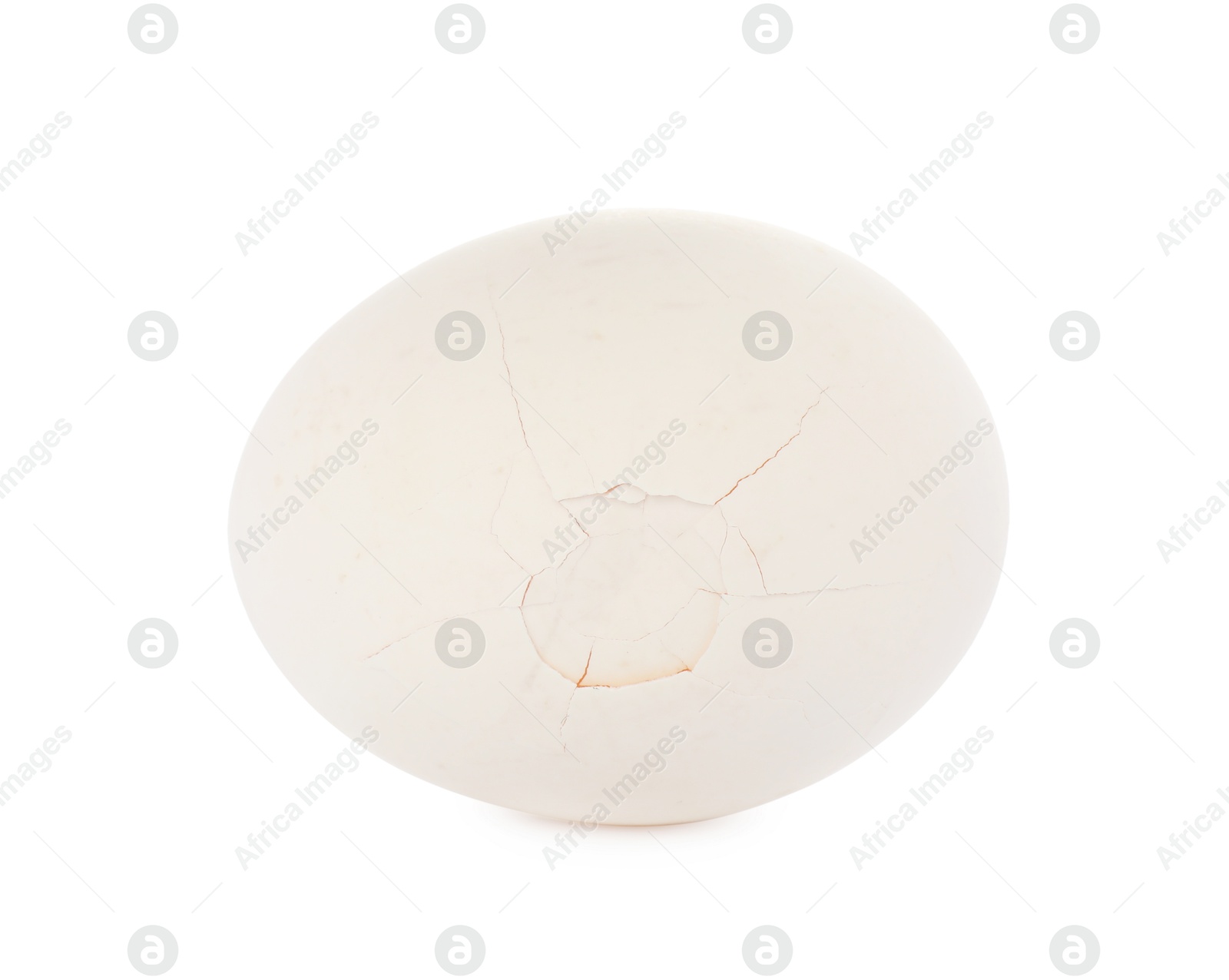 Photo of One egg with cracked shell isolated on white