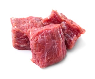 Photo of Pieces of raw beef meat isolated on white