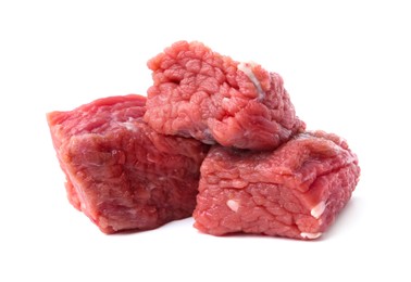 Photo of Pieces of raw beef meat isolated on white