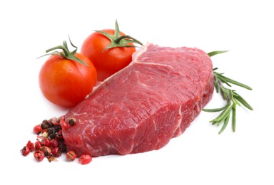 Photo of Piece of raw beef meat, rosemary, peppercorns and tomatoes isolated on white