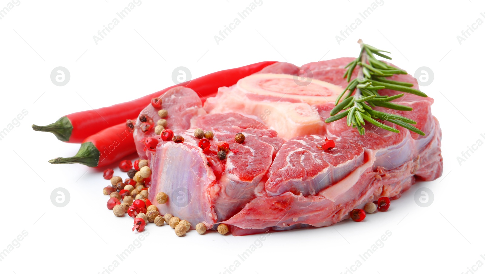 Photo of Piece of raw beef meat and spices isolated on white