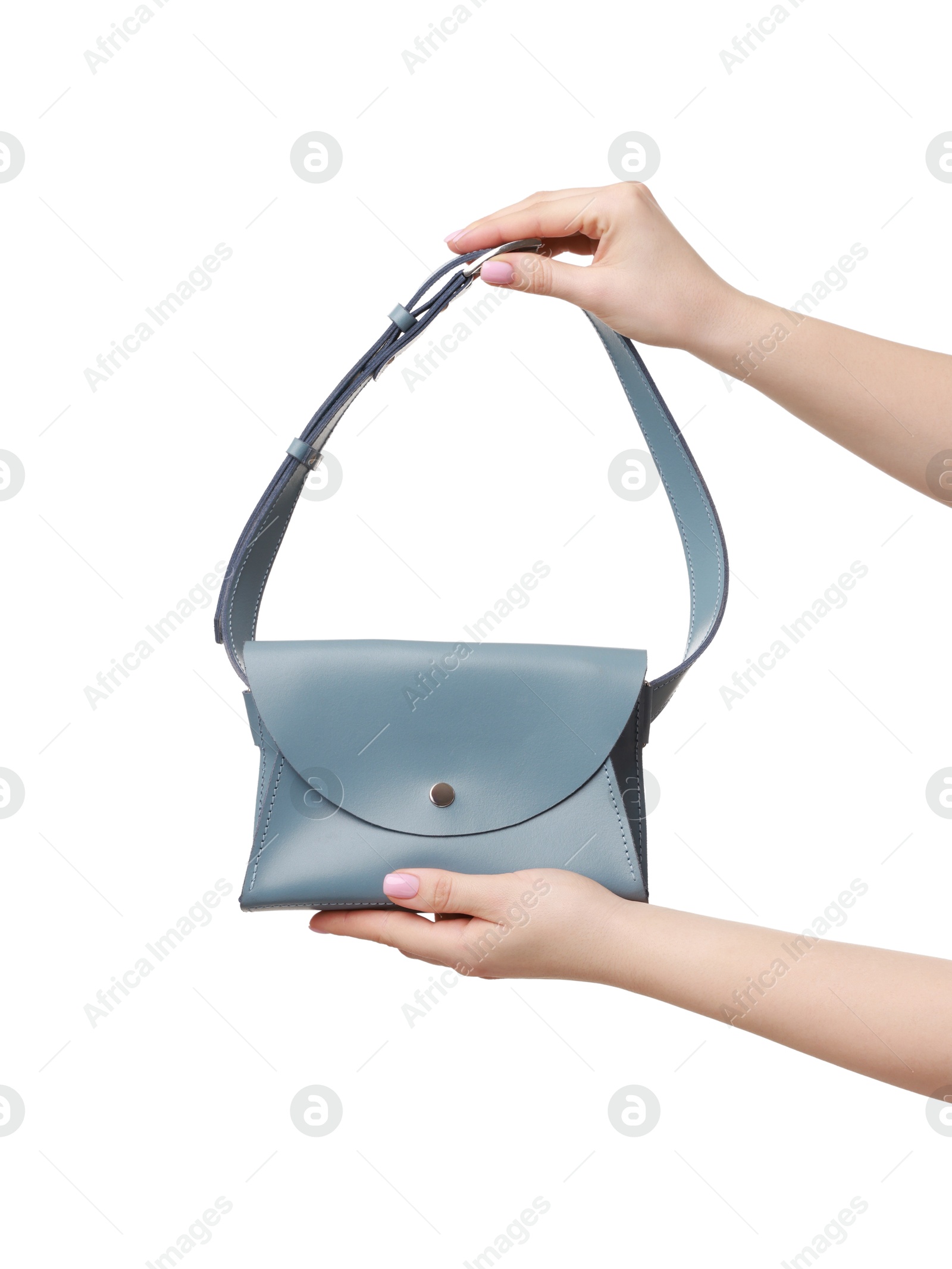 Photo of Woman with beautiful handbag on white background, closeup. Stylish accessory