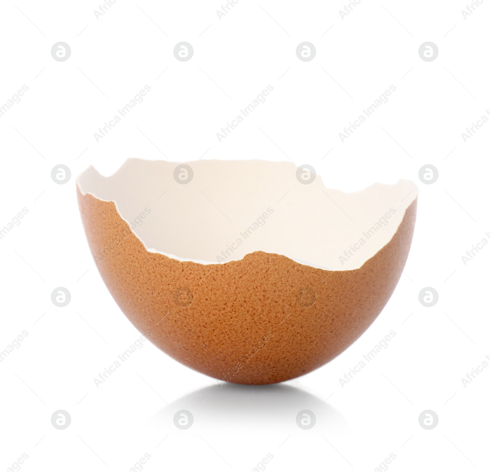 Photo of One piece of broken eggshell on mirror surface against white background