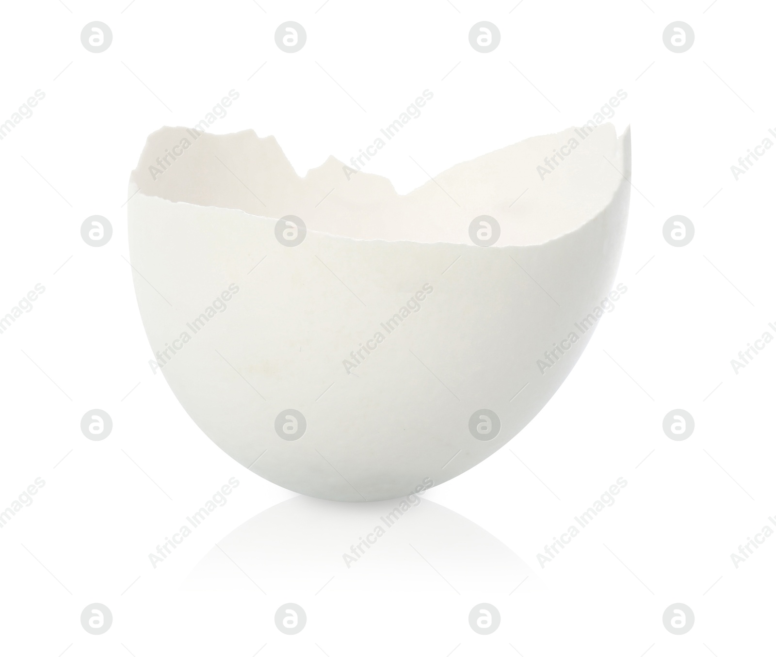 Photo of One piece of broken eggshell on mirror surface against white background