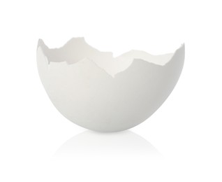 Photo of One piece of broken eggshell on mirror surface against white background