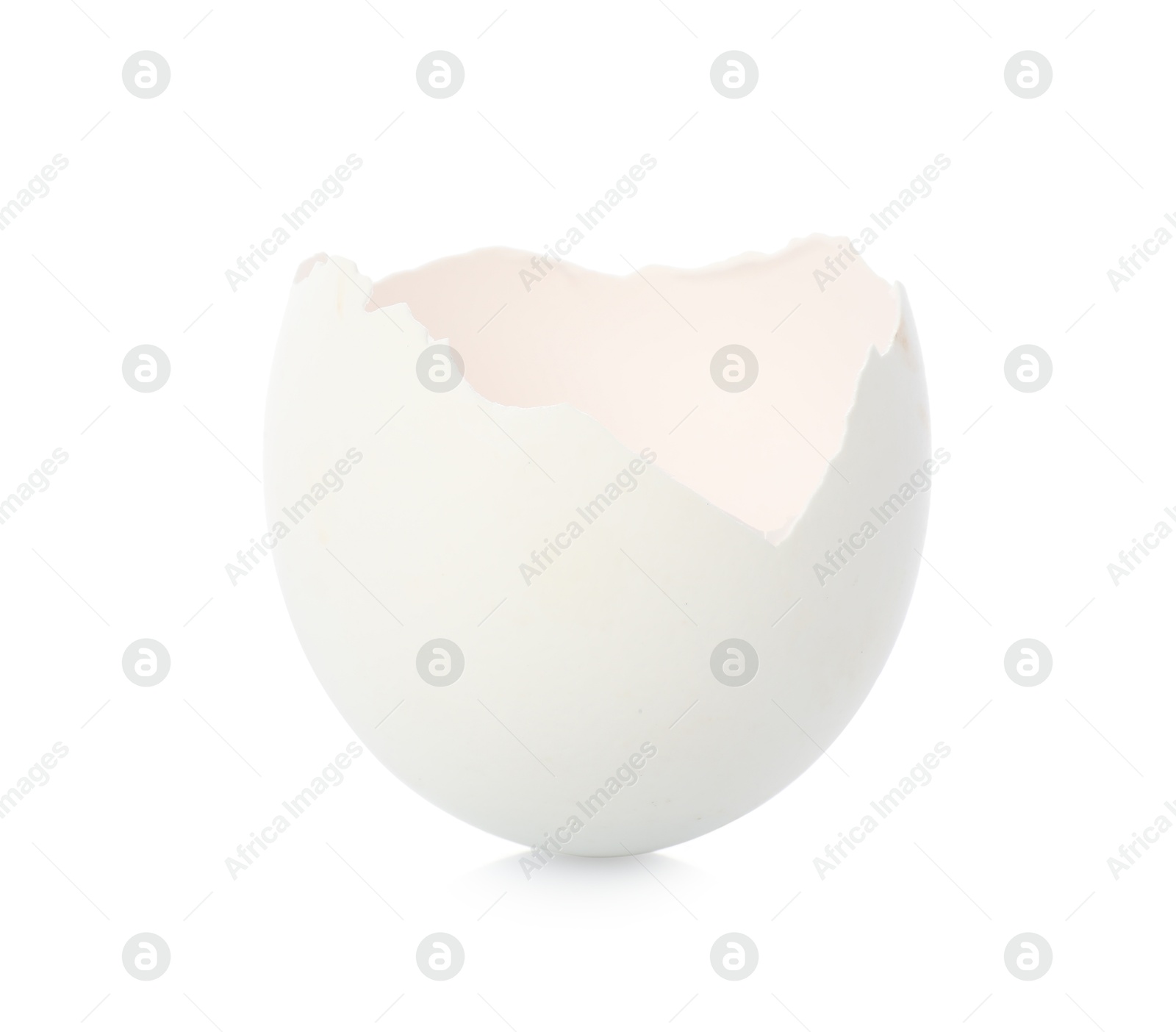 Photo of One piece of broken eggshell on mirror surface against white background