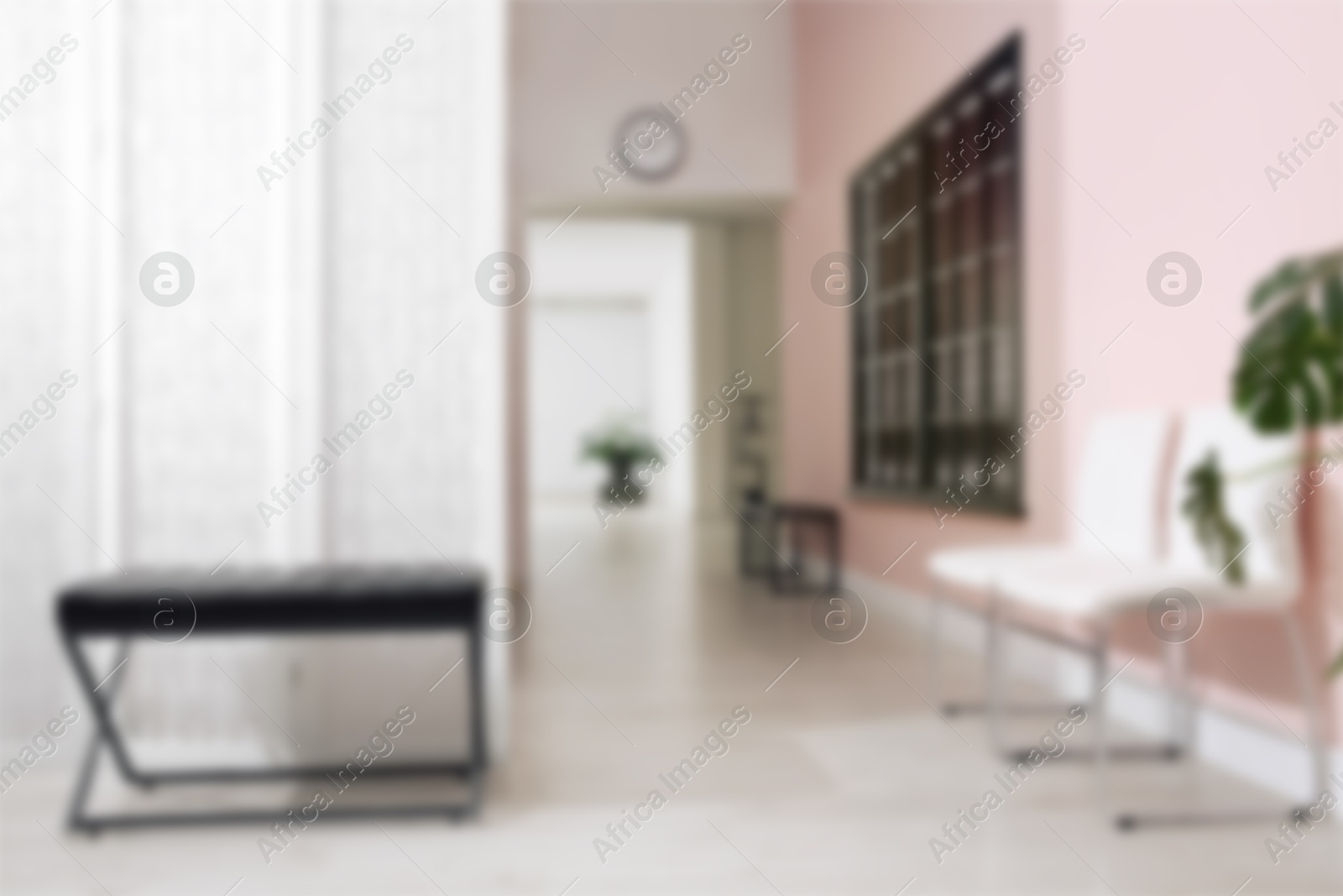 Image of Blurred view of office corridor with seats