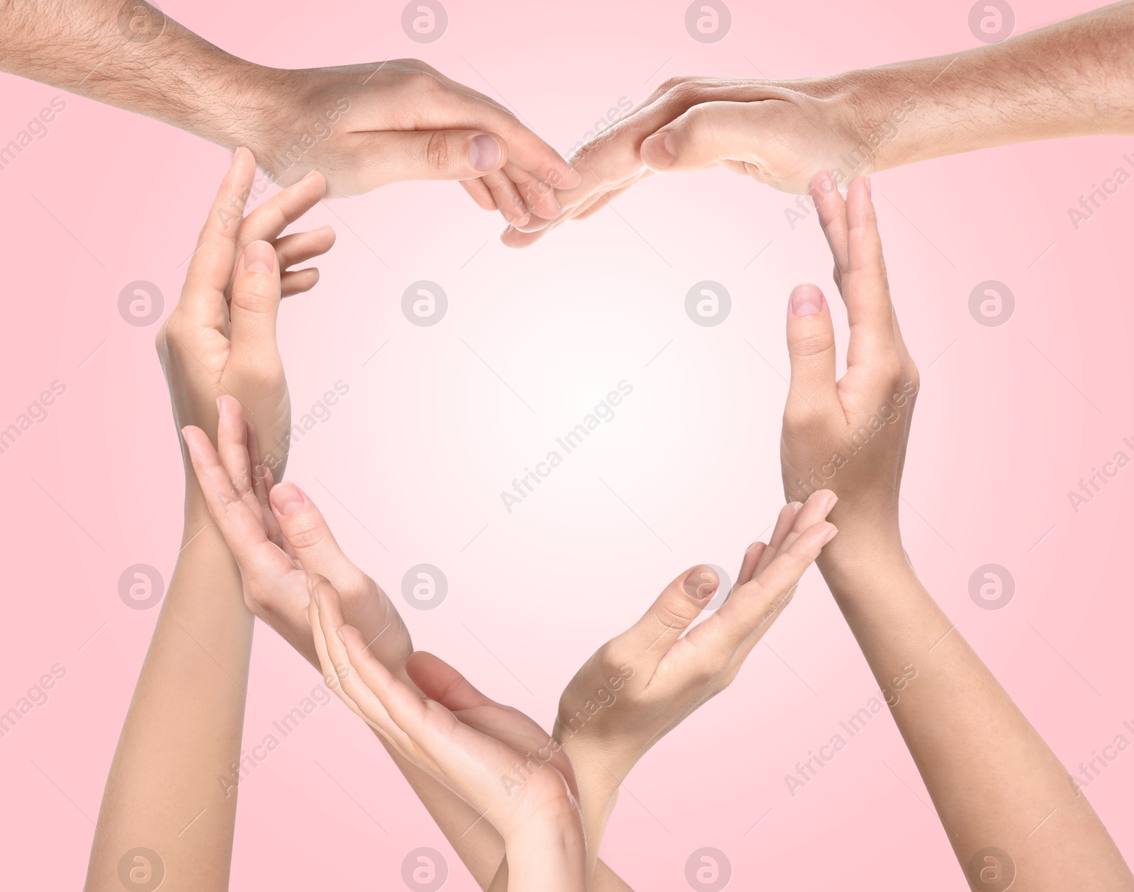 Image of People making heart shape with hands on pink background. Teamwork, unity, togetherness