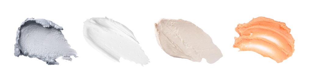 Image of Samples of different creams isolated on white, top view