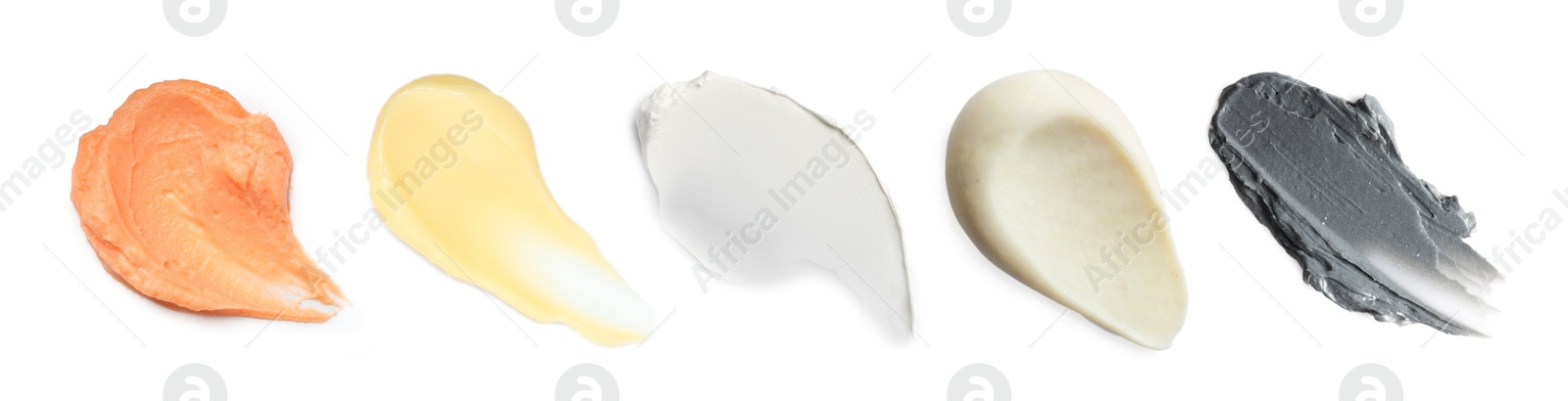 Image of Samples of different creams isolated on white, top view