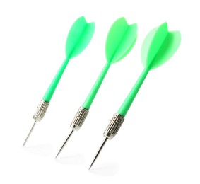 Photo of Green dart arrows in air isolated on white. Sports equipment