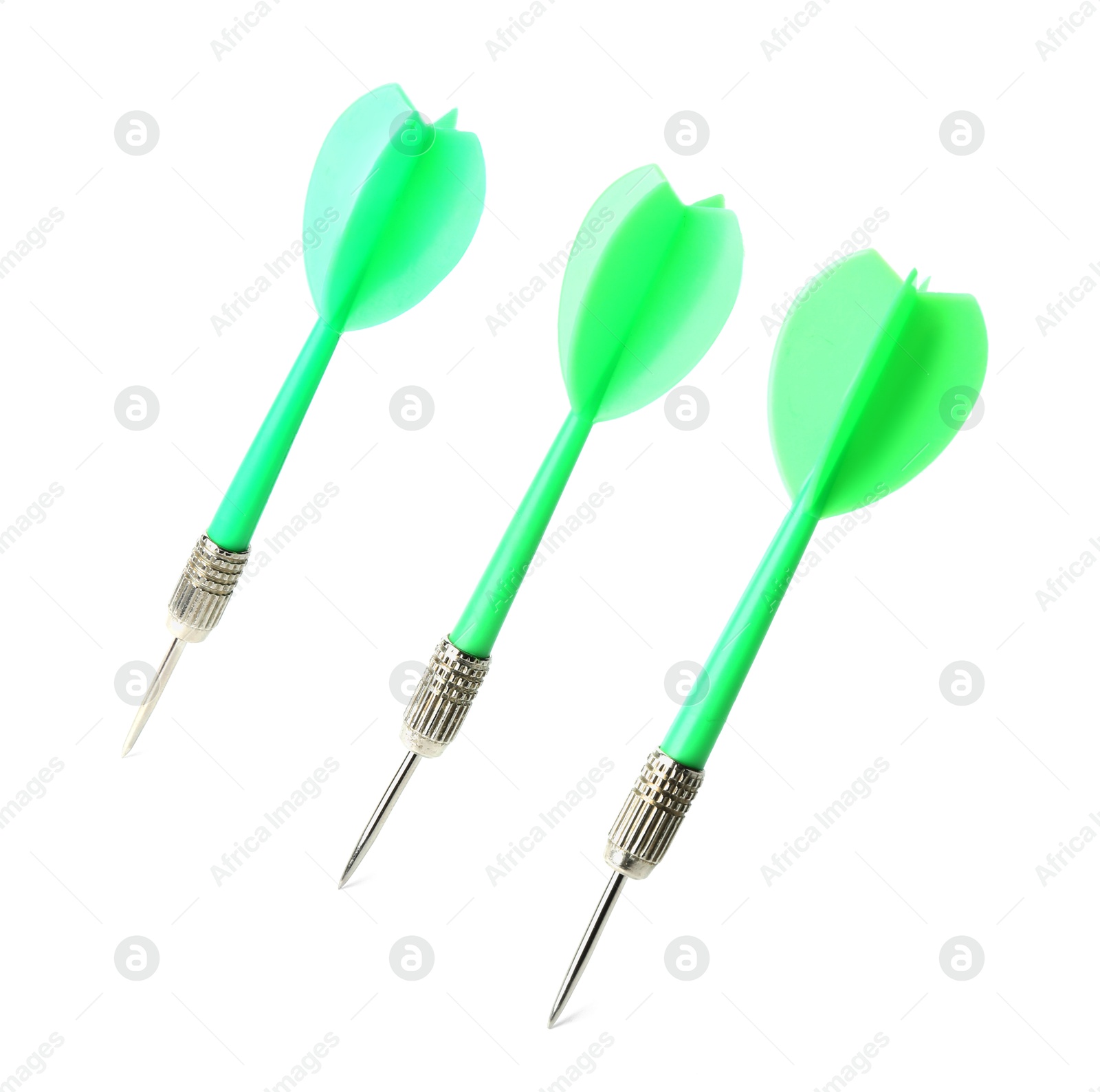 Photo of Green dart arrows in air isolated on white. Sports equipment