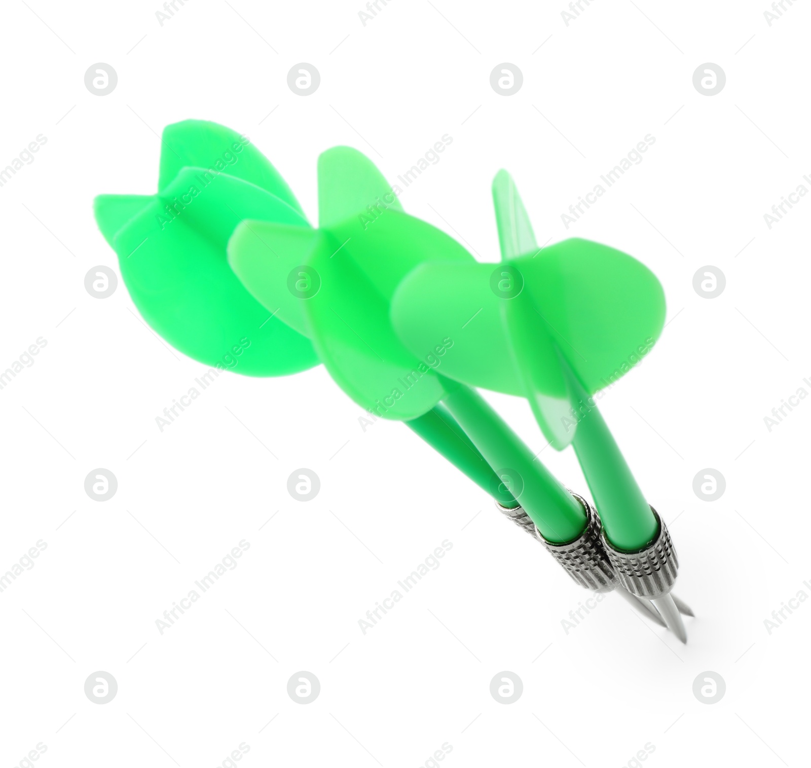 Photo of Green dart arrows in air isolated on white. Sports equipment