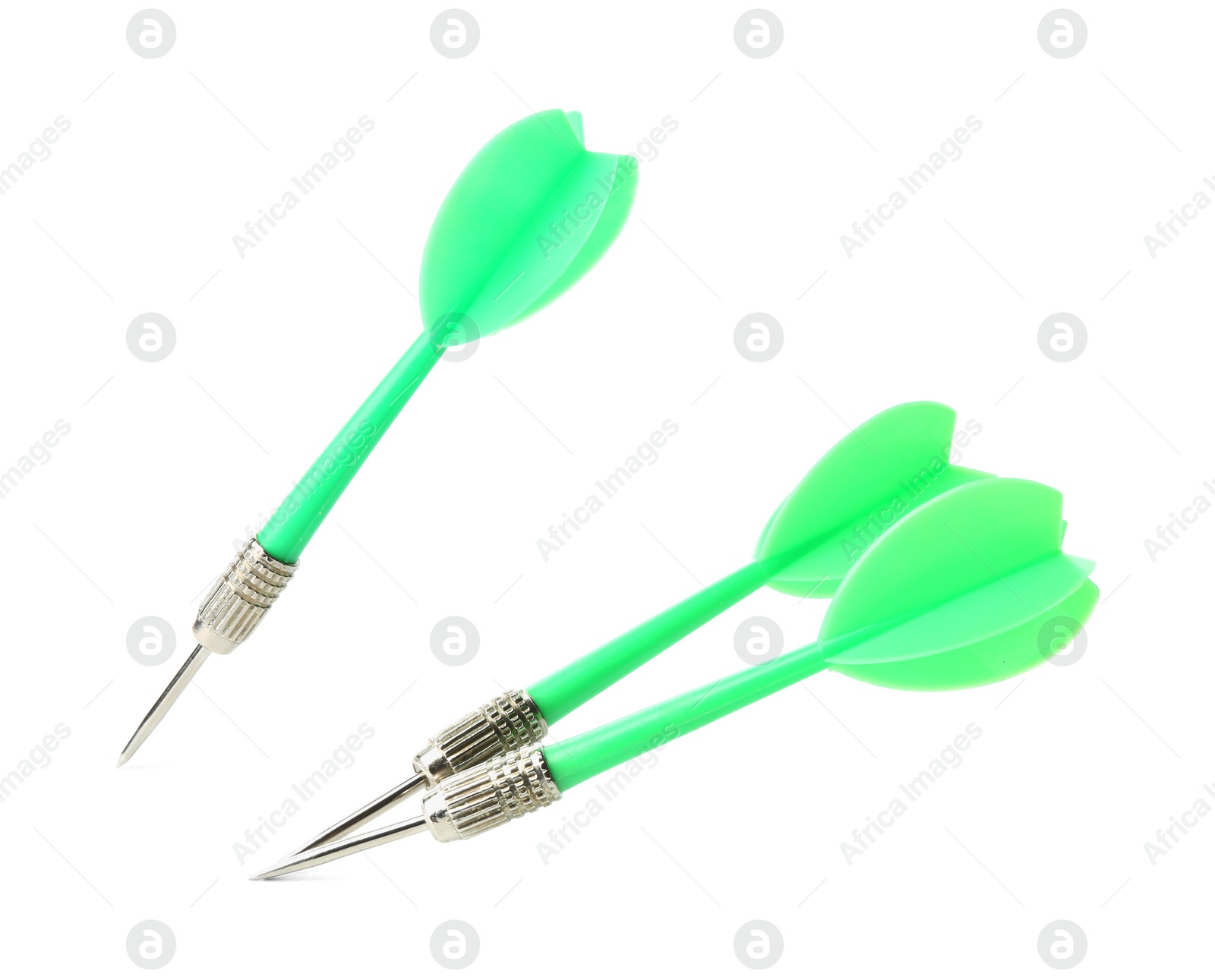 Photo of Green dart arrows in air isolated on white