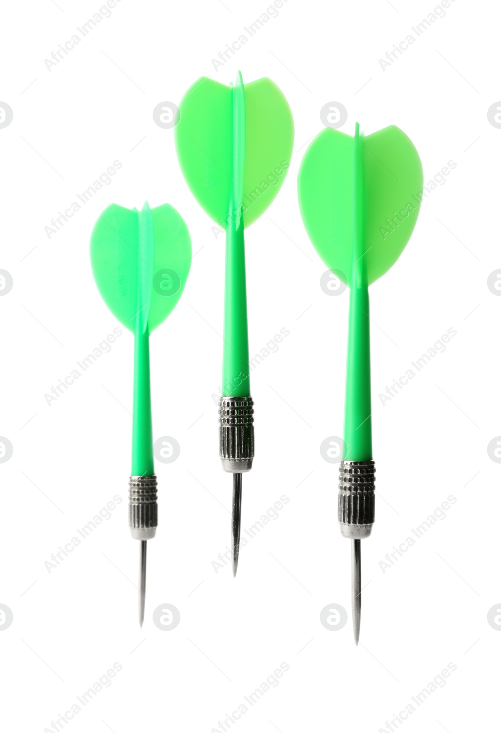 Photo of Green dart arrows in air isolated on white