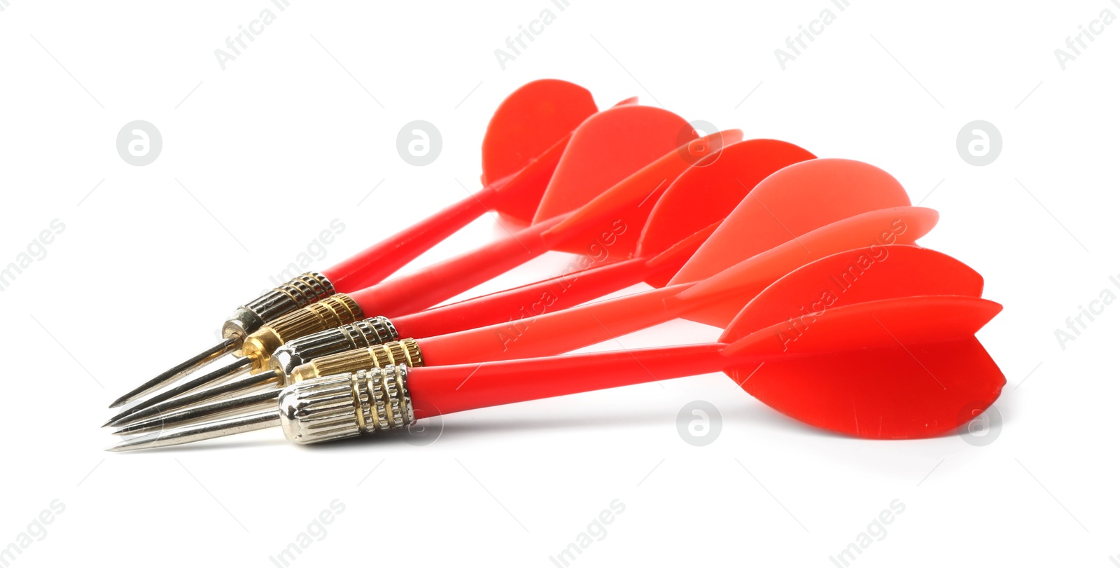 Photo of Red dart arrows isolated on white. Sports equipment