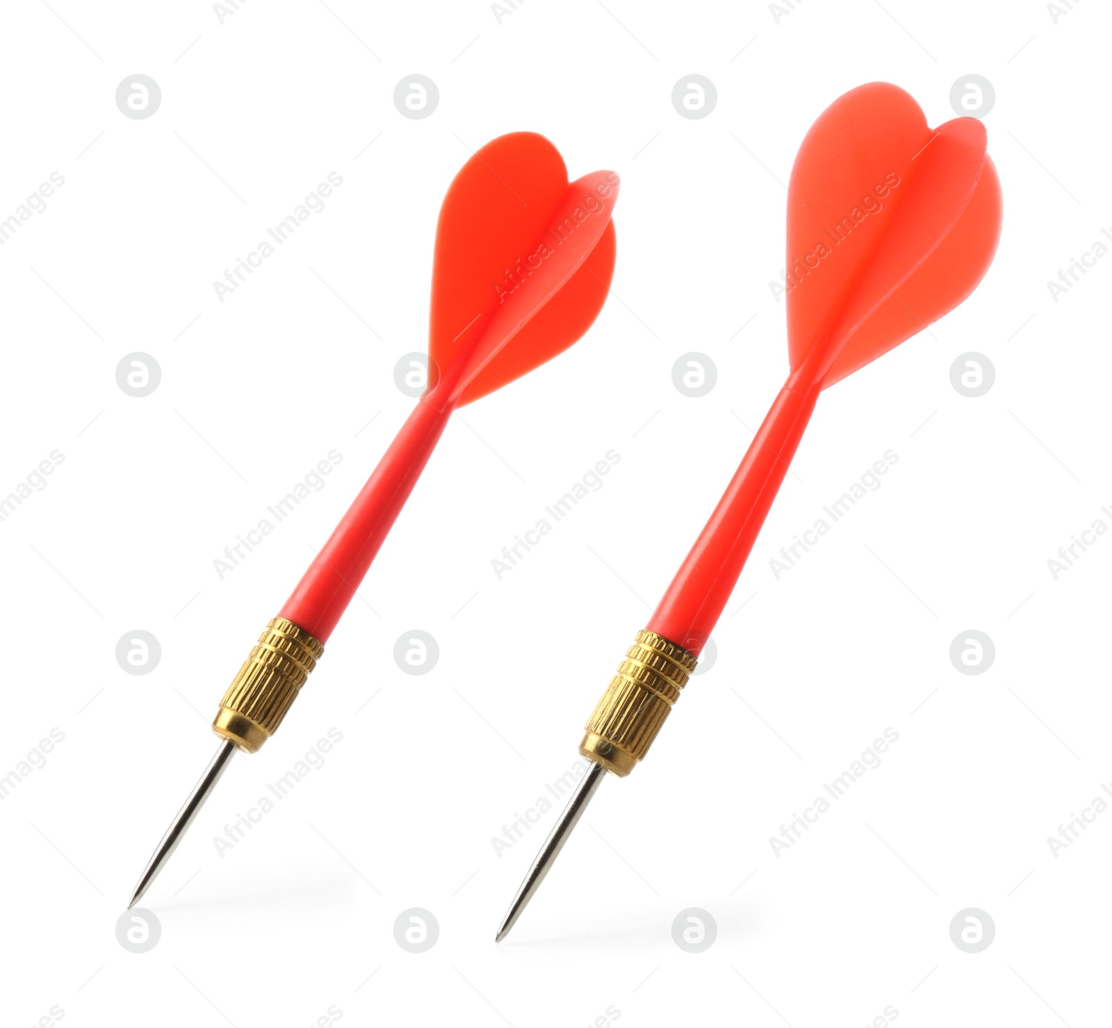 Photo of Red dart arrows in air isolated on white. Sports equipment