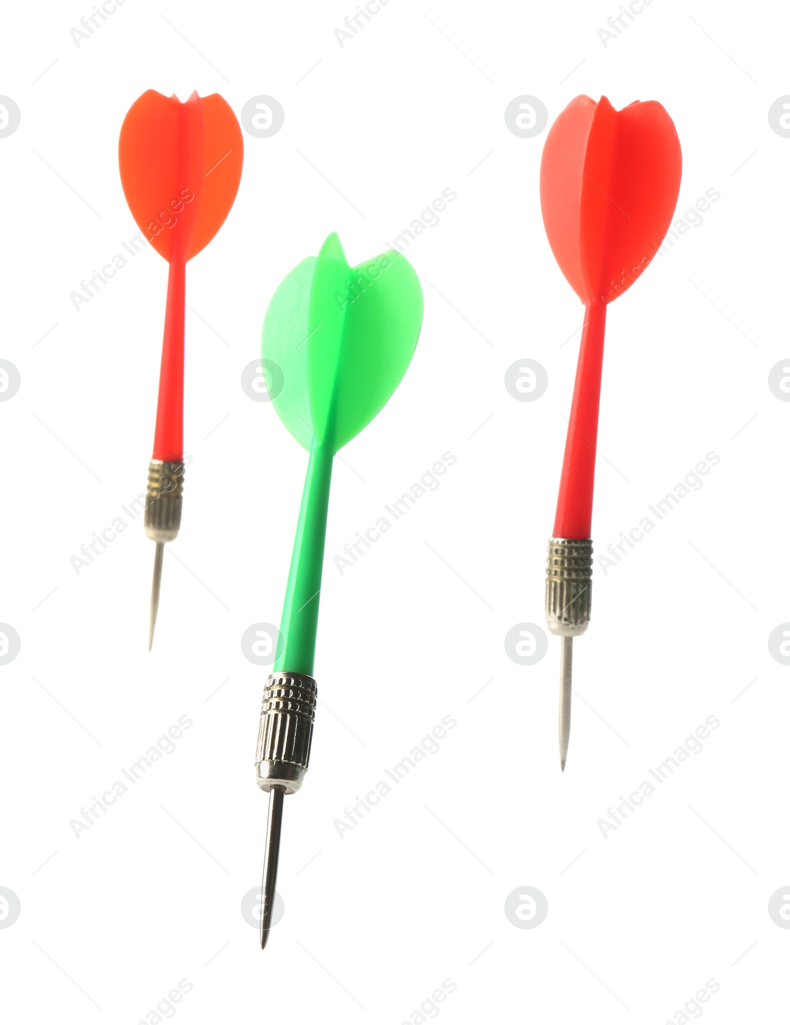 Photo of Colorful dart arrows in air isolated on white. Sports equipment