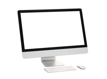 Photo of Computer monitor, keyboard and mouse isolated on white