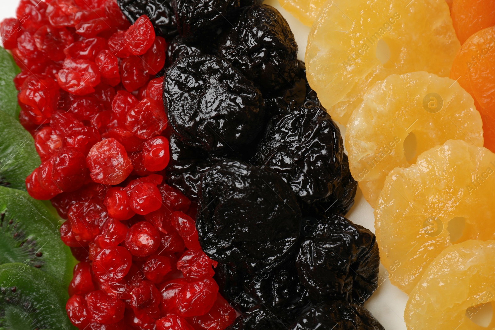 Photo of Different dried fruits on table, top view