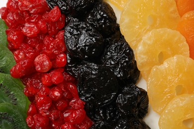 Photo of Different dried fruits on table, top view