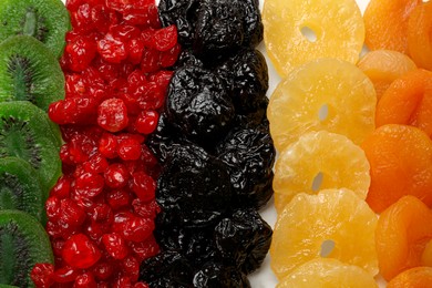 Photo of Different dried fruits on table, top view