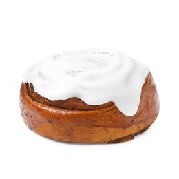 Photo of Tasty cinnamon roll with cream isolated on white