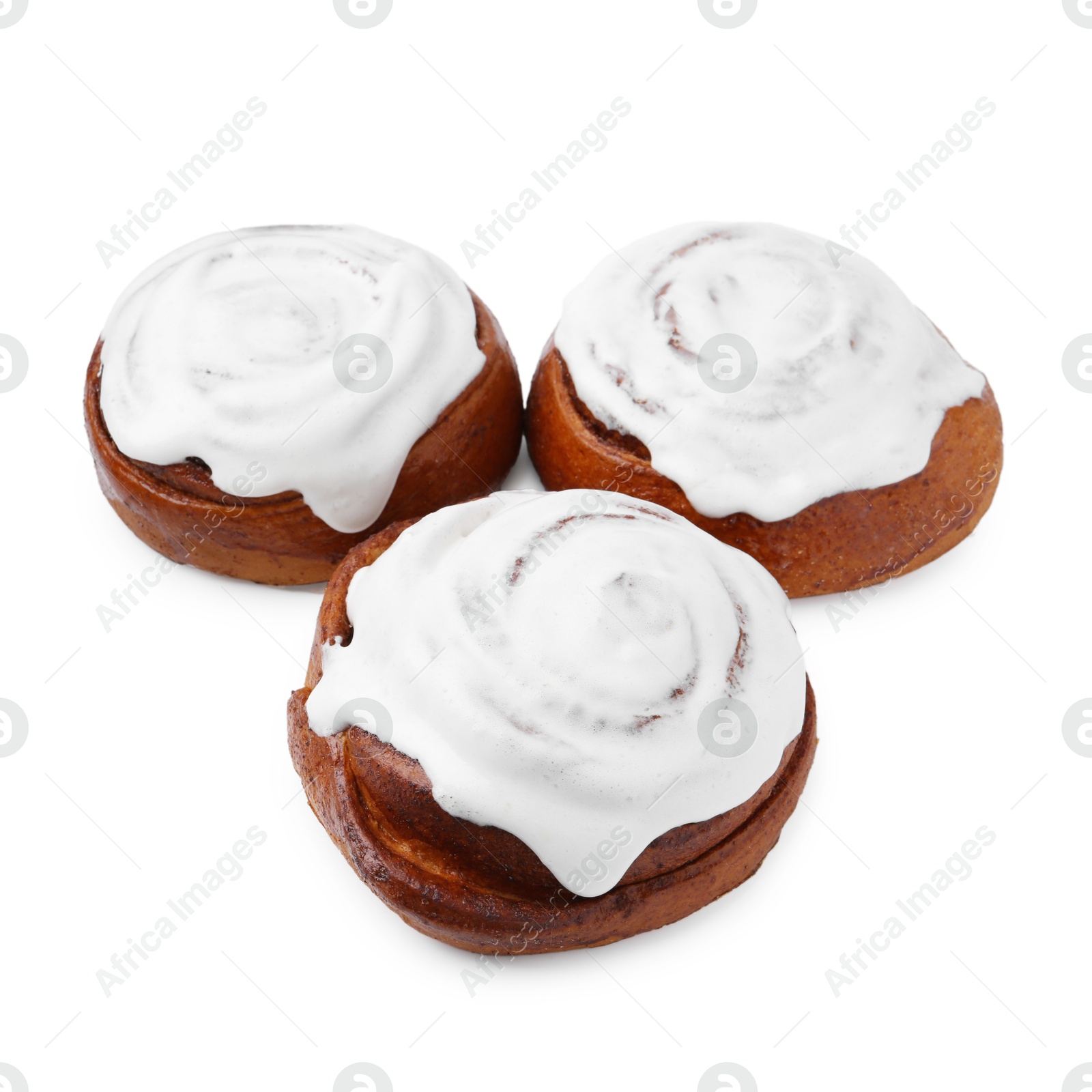 Photo of Tasty cinnamon rolls with cream isolated on white