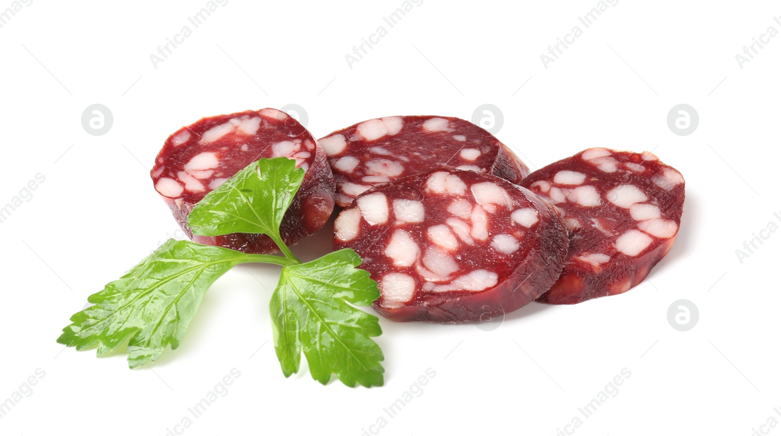 Photo of Pieces of delicious dry cured sausage and parsley isolated on white