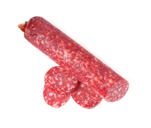 Photo of Delicious dry cured sausage isolated on white, top view